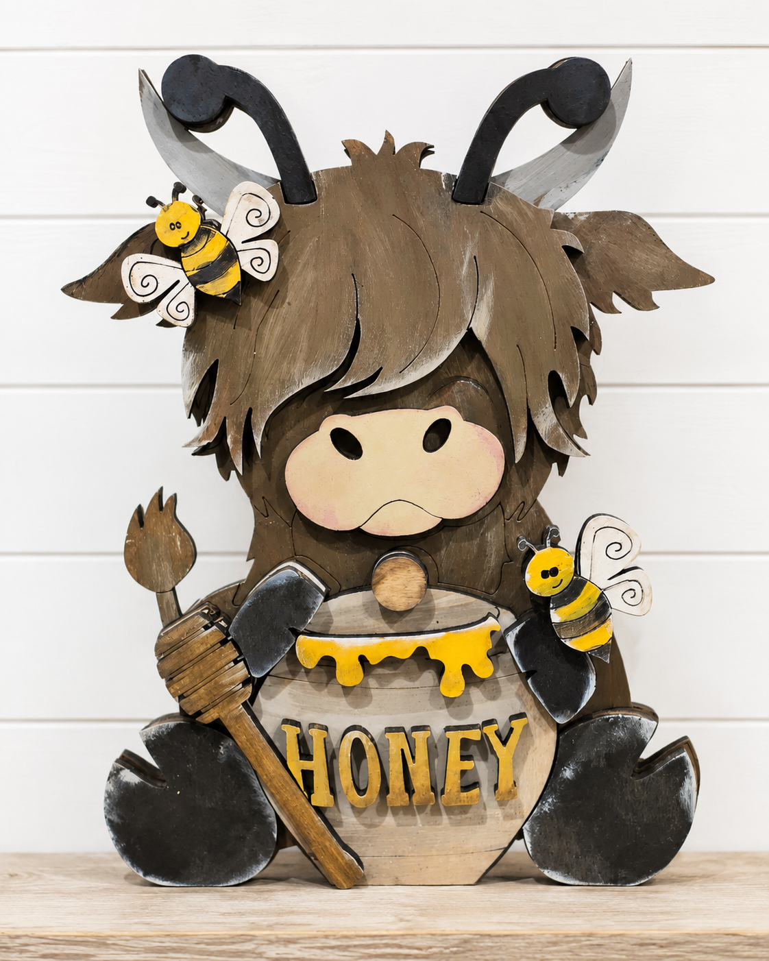 Bee Cow Highland sitter