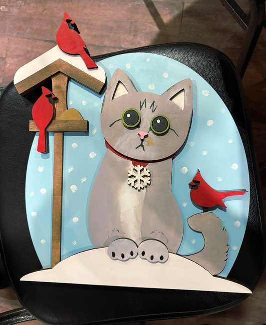 Cat with cardinal